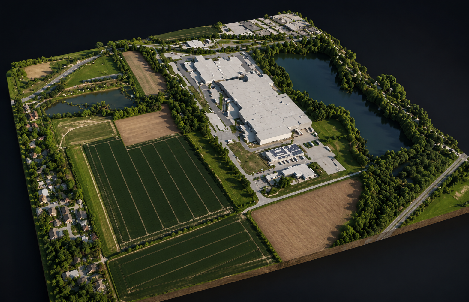 A three-dimensional terrain model of an industrial site with surrounding fields and water